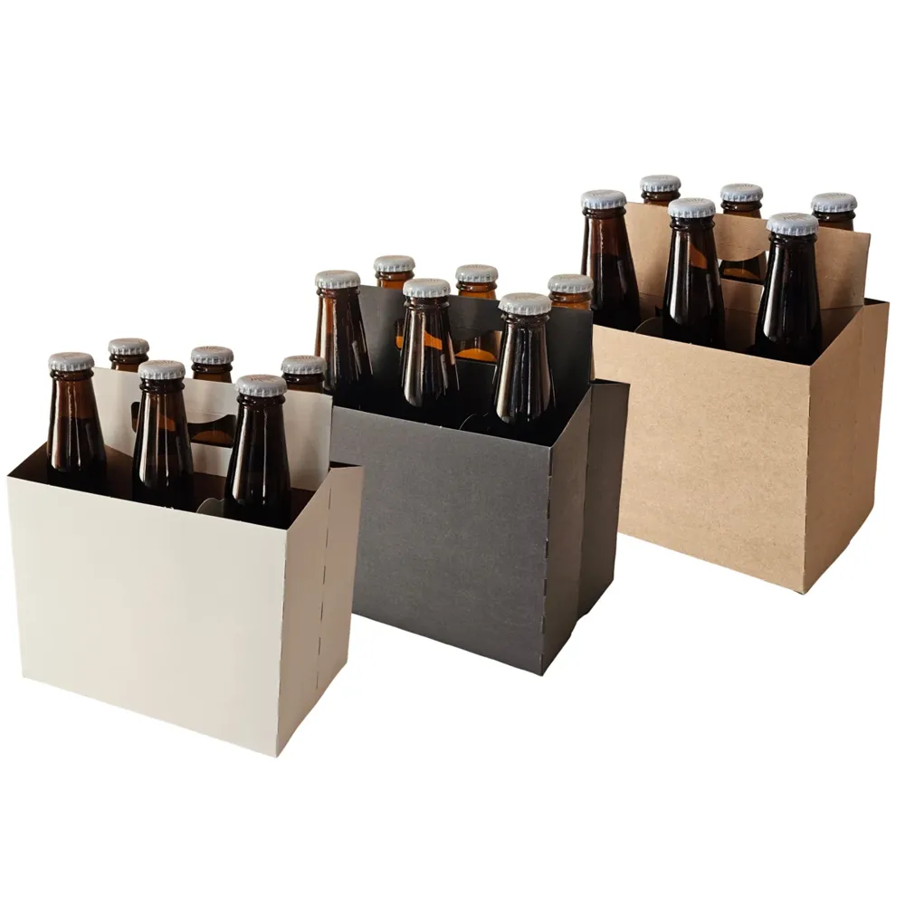 Cardboard bottle carriers in white, black and kraft